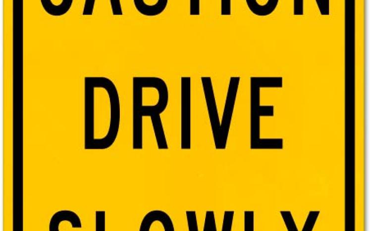 drive slowly sign